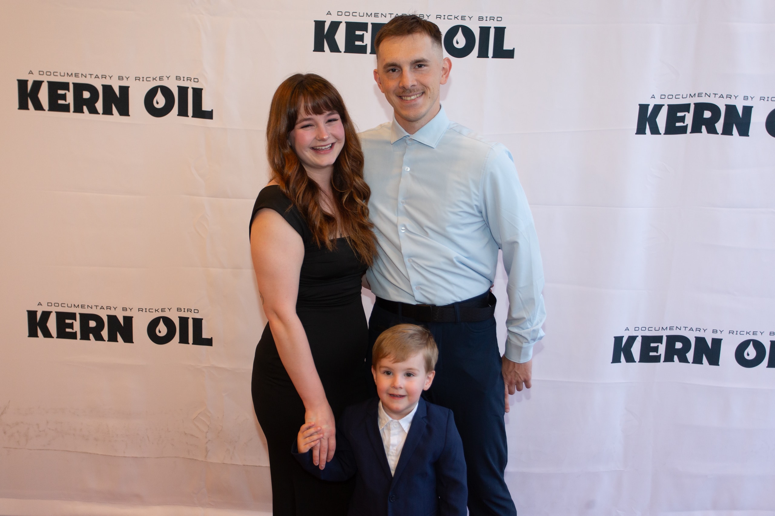 Family posing at Kern Oil documentary premiere