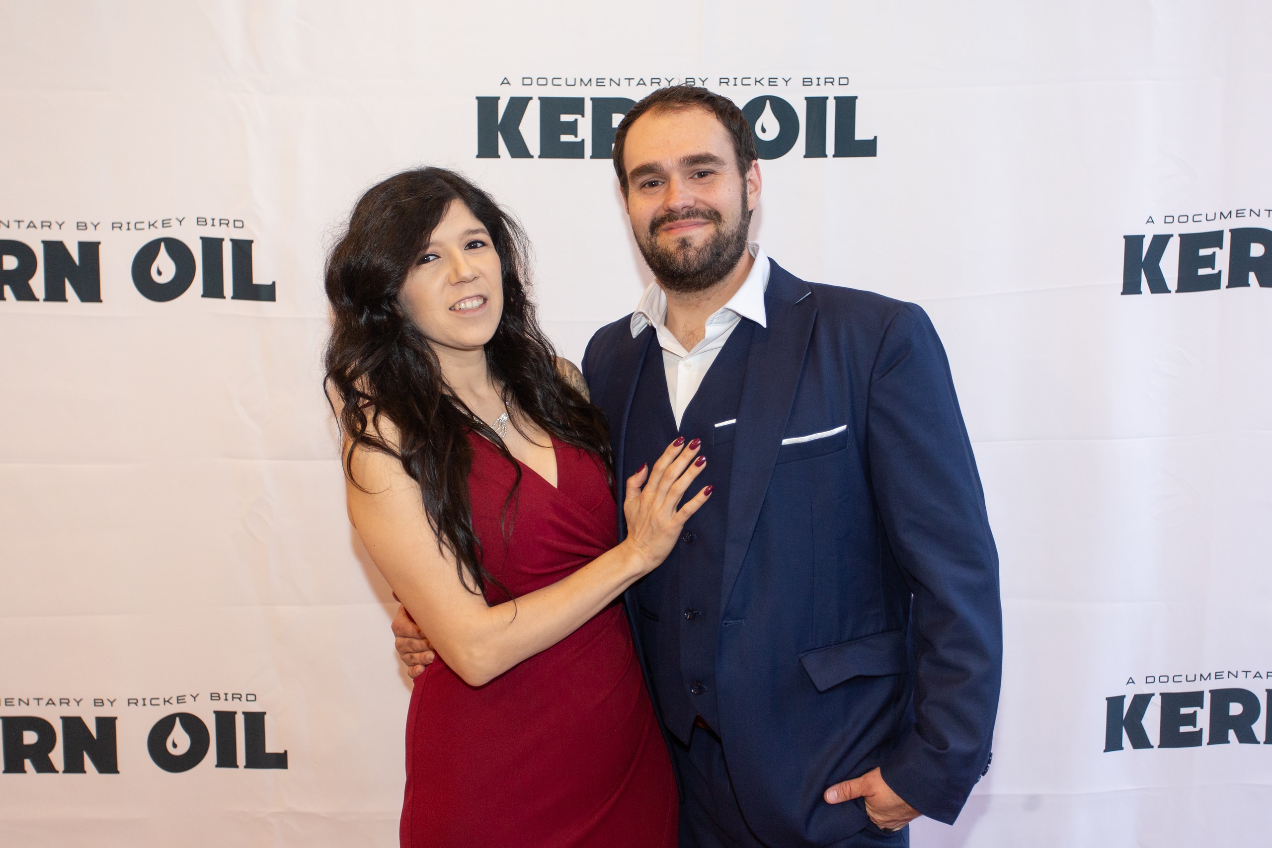 Couple posing at Kern Oil documentary premiere