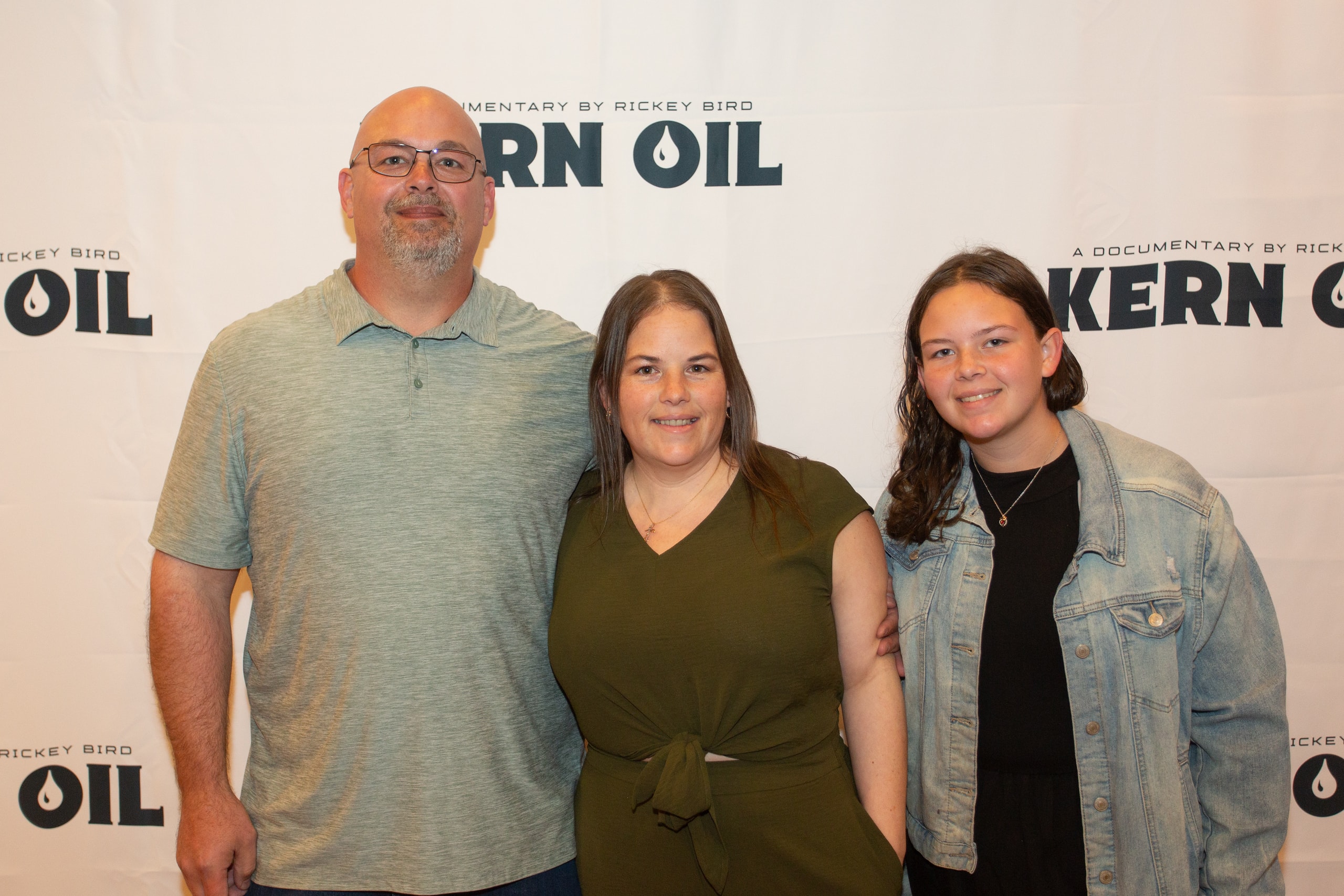 Family posing at Kern Oil documentary premiere