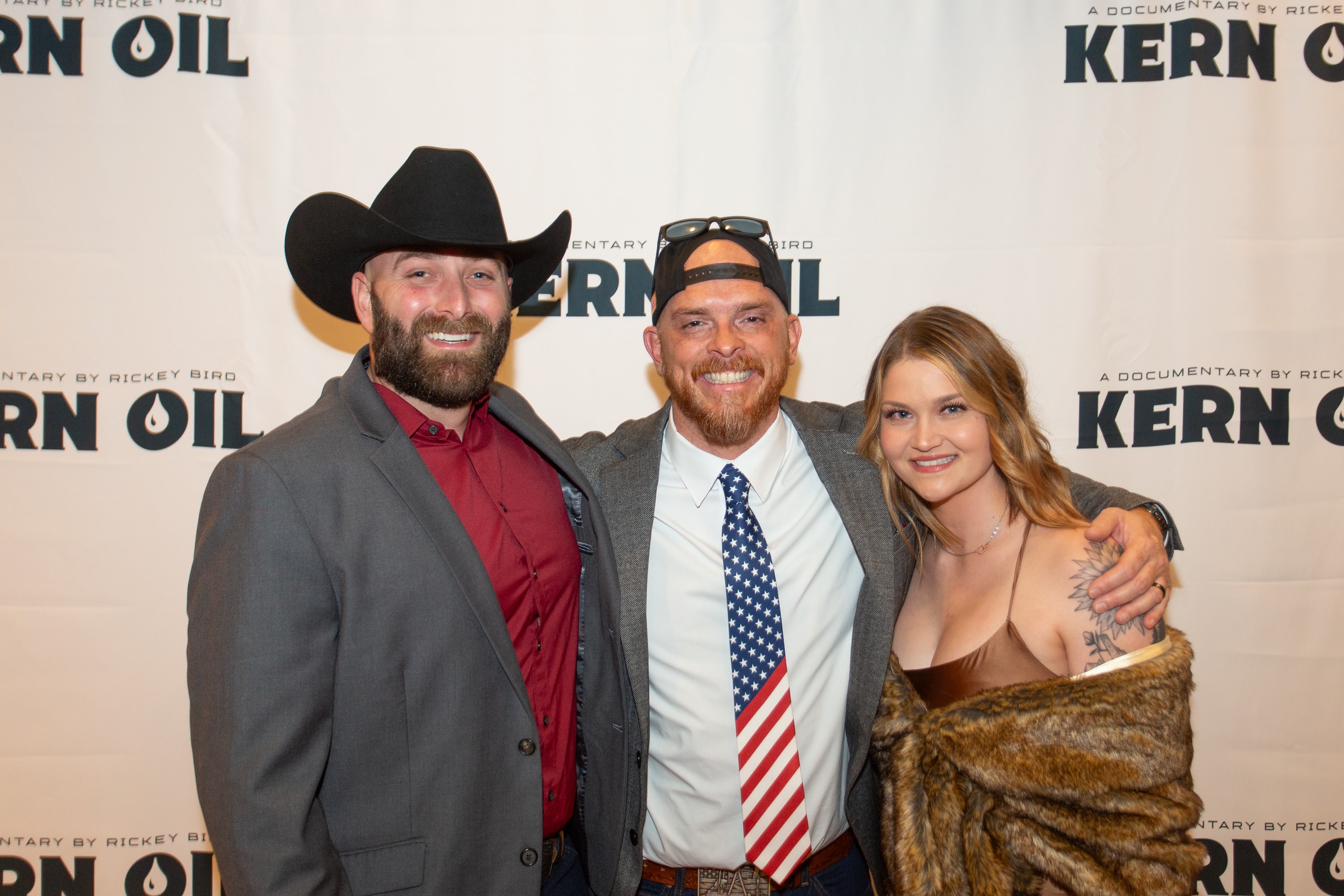 Three people posing at Kern Oil documentary premiere