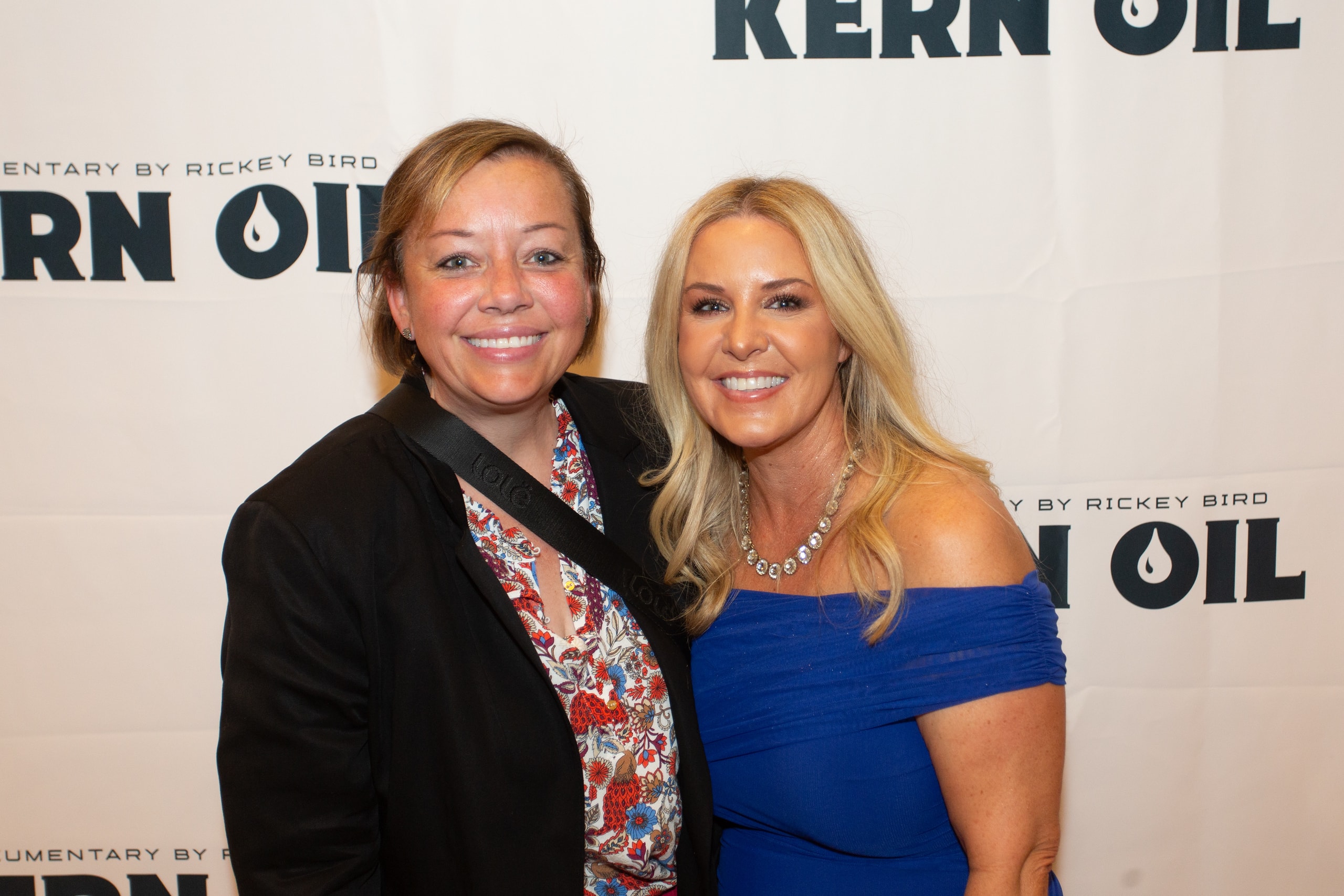 Two women at Kern Oil premiere event