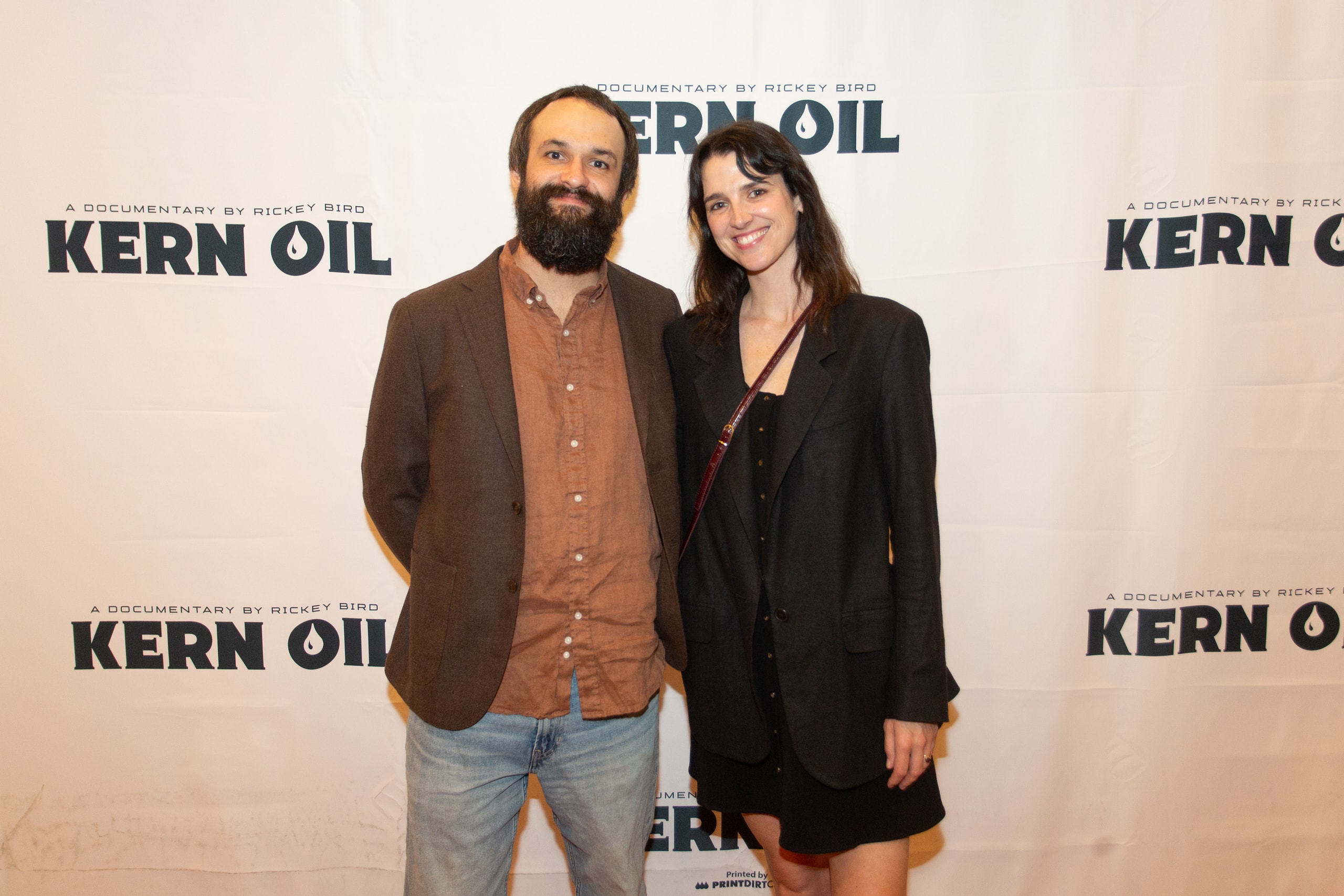 Two people at Kern Oil documentary premiere