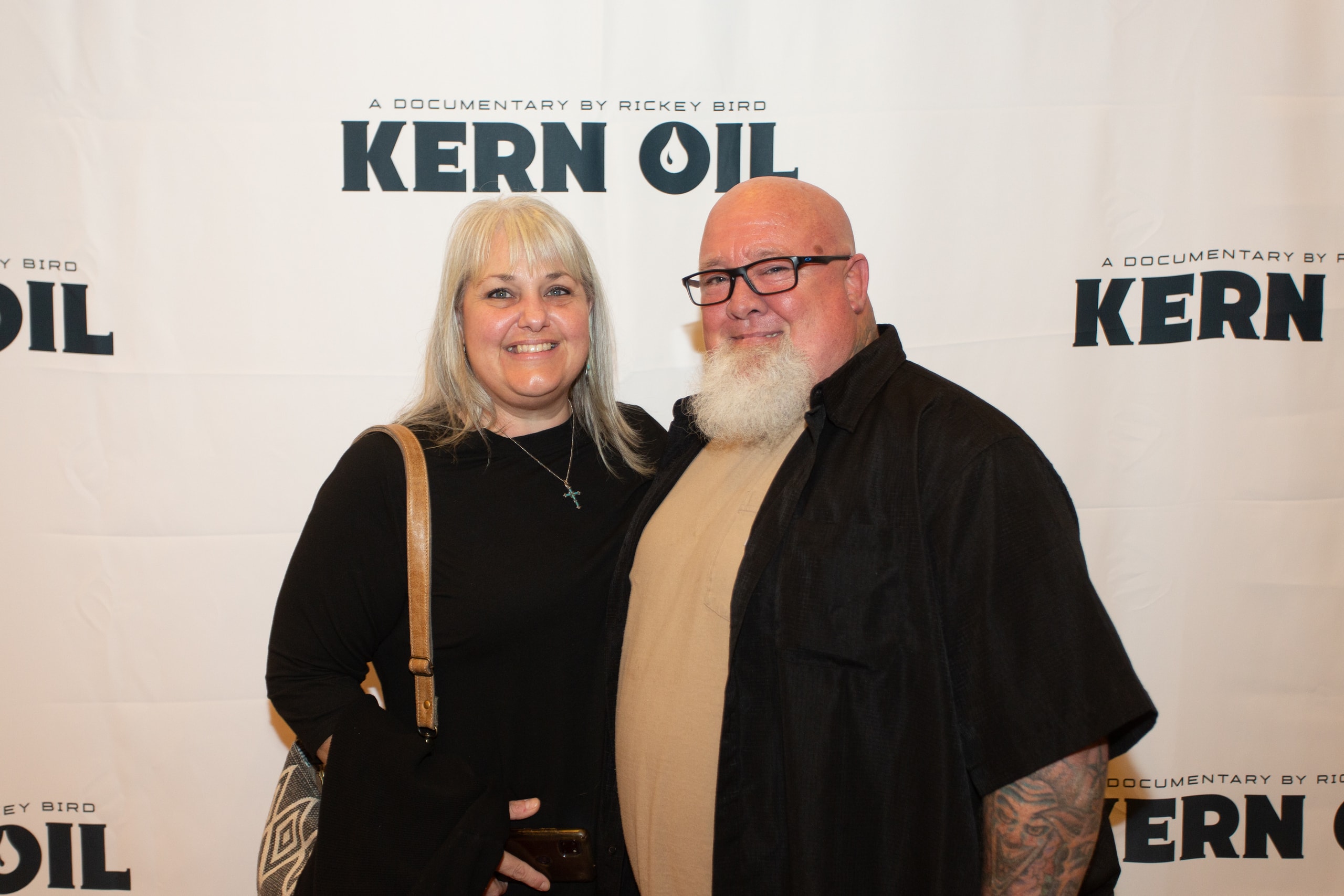 Two people at Kern Oil documentary premiere