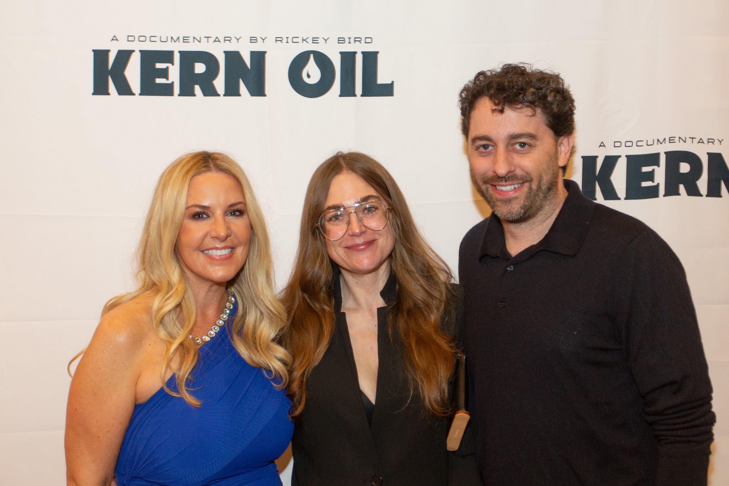 Three people at Kern Oil documentary premiere