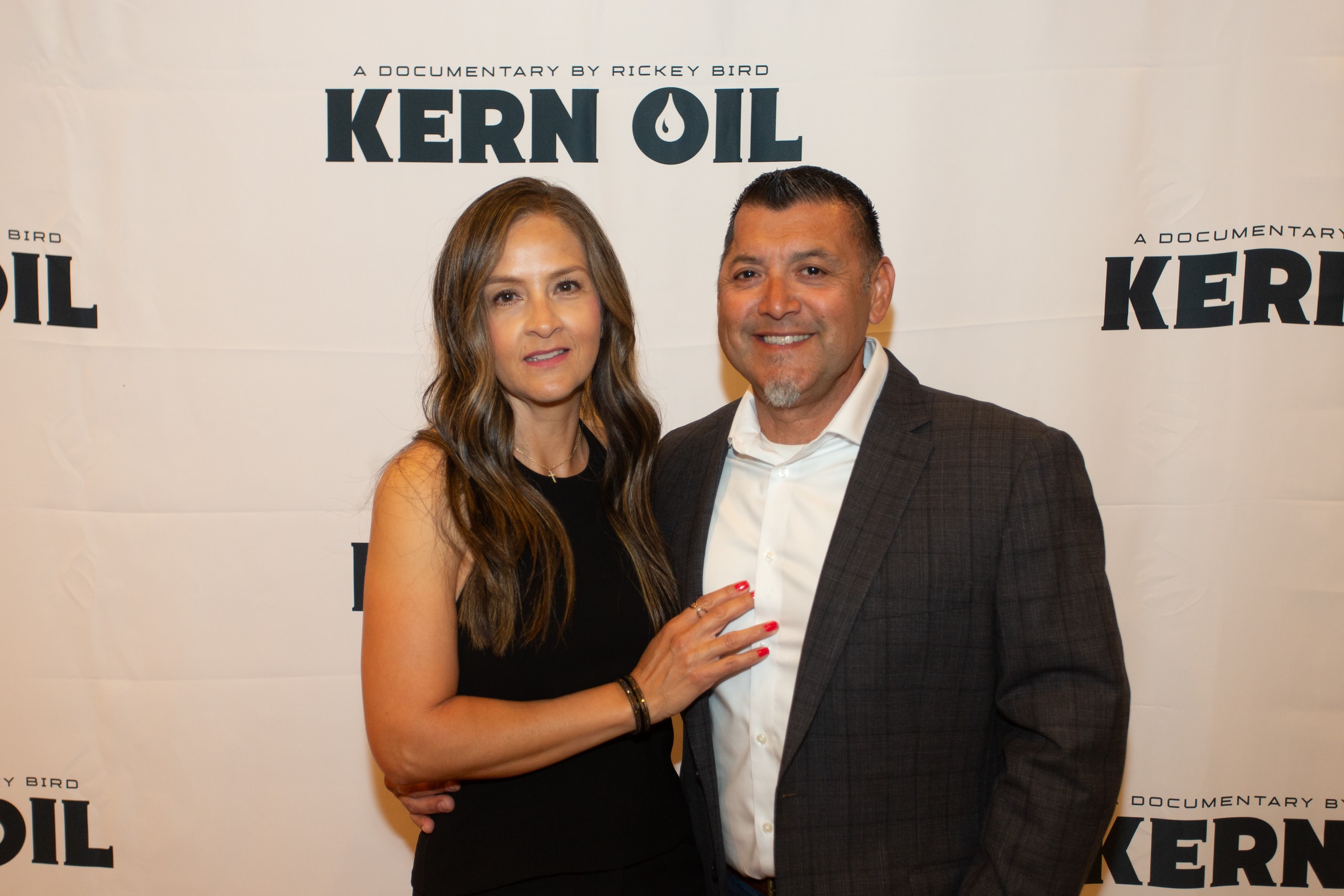 Couple posing at Kern Oil documentary premiere