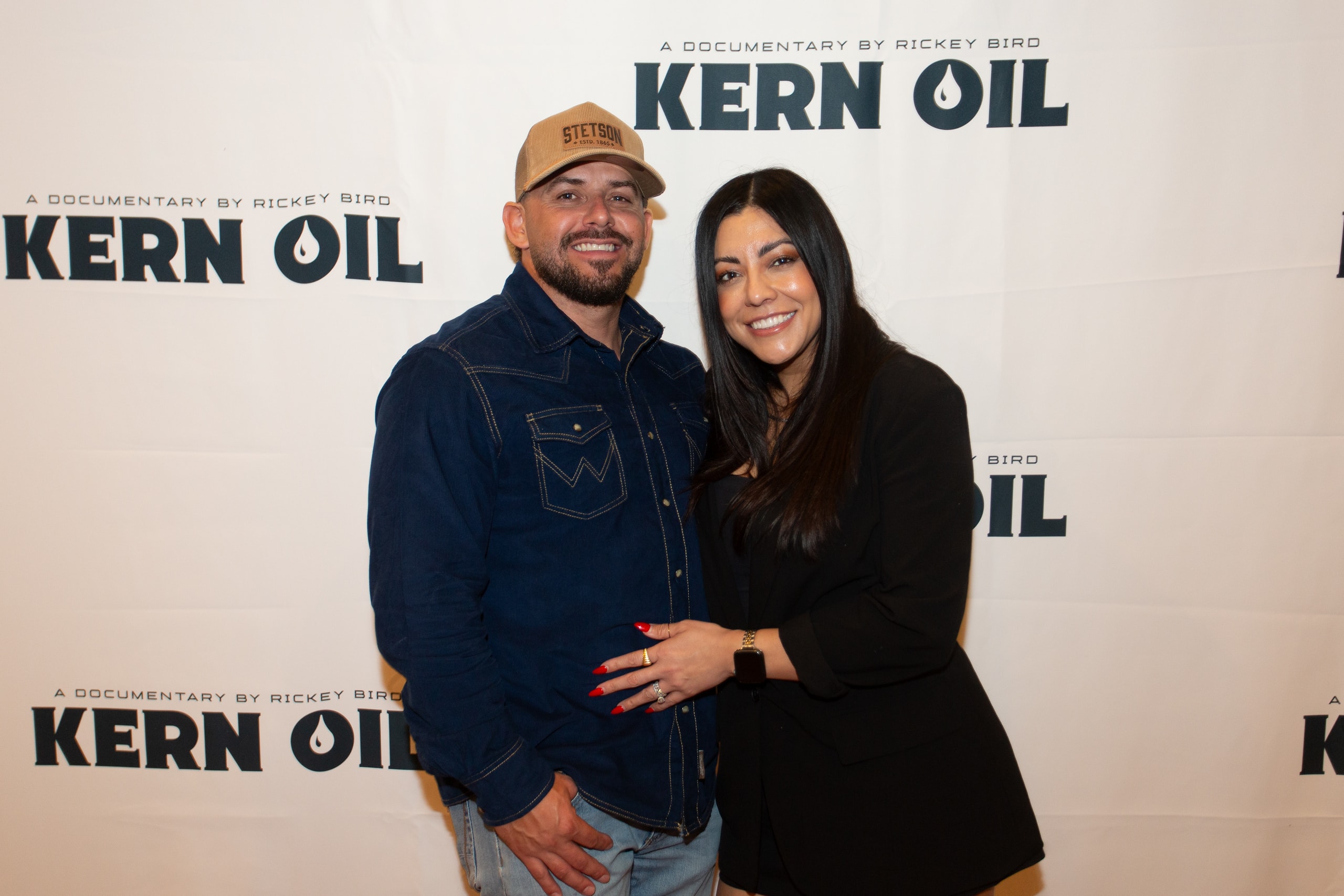 Couple posing at Kern Oil documentary premiere